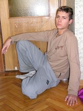 Skinny twink with sexy legs posing face down ass up on camera