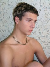 Slim guy with a perfectly tanned body shows off everything