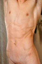 Sexy twink with an extremely muscular body shows his ass as well