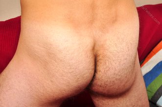 Sexy twink with an extremely muscular body shows his ass as well
