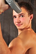 Good-looking guy lifting weights and looking sexy as fuck
