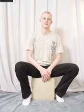Albino-looking twink shows off his great-looking body here