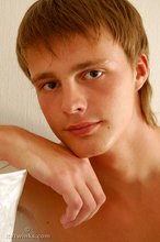 Naked guy puts on his shades to strike a few very sexy poses