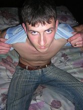 Young twink showing his soles and toes in the dark while stripping