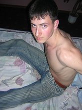 Young twink showing his soles and toes in the dark while stripping