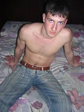 Young twink showing his soles and toes in the dark while stripping