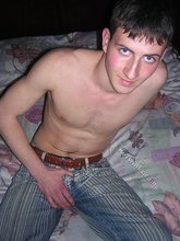 Young twink showing his soles and toes in the dark while stripping