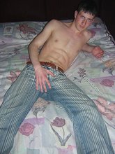 Young twink showing his soles and toes in the dark while stripping