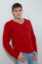 Dark-haired guy dressed in red teases his nips thru the sweater