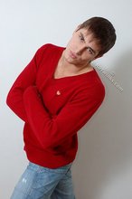 Dark-haired guy dressed in red teases his nips thru the sweater