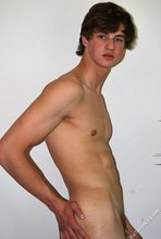 Young brunette dude with shaggy-ish hair shows his ass as well