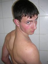 Blue-eyed guy showing that booty and looking all handsome