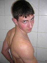 Blue-eyed guy showing that booty and looking all handsome