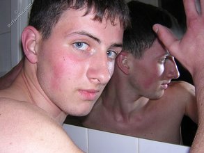 Blue-eyed guy showing that booty and looking all handsome