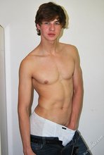 Young guy with beautiful hair teases you with his boner
