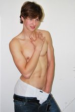 Young guy with beautiful hair teases you with his boner