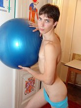 Dark-haired guy with a hairy cock dry-humps a blue fitness ball