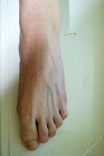 Young beauty with a body showing his feet and cock on camera