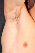 Dark-haired guy with an honest smile shows his tight ass