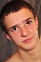 Dark-haired guy with an honest smile shows his tight ass