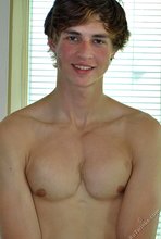 Young beauty showing off his cum-soaked pubes up close