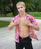 Big-dicked twink boy posing in Hawaiian shirts outdoors