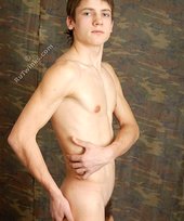 Artistic twink with a big cock showing off his load