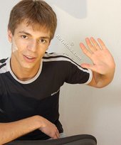Black t-shirt dark-haired dude showing his body