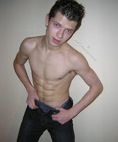 Spiked hair seductive twink showing his ass