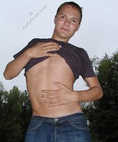 Jeans-wearing dude showing his amazing body on cam