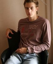 Beautiful guy takes off his sexy shirt on camera