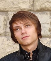 Twink dressed in all black starts undressing on cam