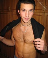 Cool dude takes off his black sleeveless t-shirt
