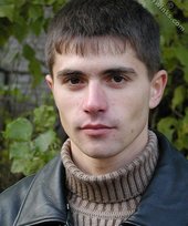 Smoking hot twink posing seductively outdoors