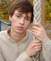 Dark-haired twink posing outdoors (with rope)