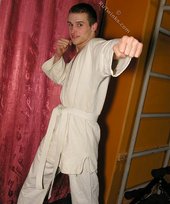 Karate twink practicing his sick punches and posing naked
