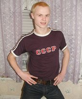 Blond-haired twink drinking and smelling flowers