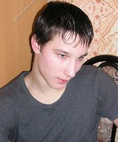 Young boy taking his shirt off and looking sexy