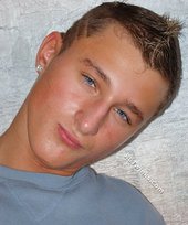 Tanned and sexy twink blonde posing seductively for you