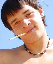 Smoking hot twink decides to take his shirt off
