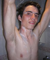 Lanky twink showering and showing off his cock