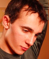 Delicious twink shows off his beautiful body in a doorway