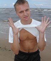 Jacked-up blonde twink doing push-ups outdoors