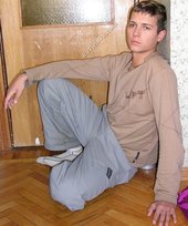 Skinny twink with sexy legs posing face down ass up on camera