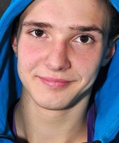 Good-looking guy lifting weights and looking sexy as fuck