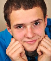 Dark-haired guy with an honest smile shows his tight ass