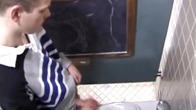 Striped shirt twink jerking his hairy cock on cam