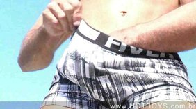 Jacked-up dude with a perfect body jerking off outdoors