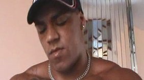 Jacked-up black dude jerking his cock like crazy