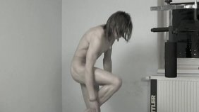 Gorgeous long-haired dude jerking in the gym